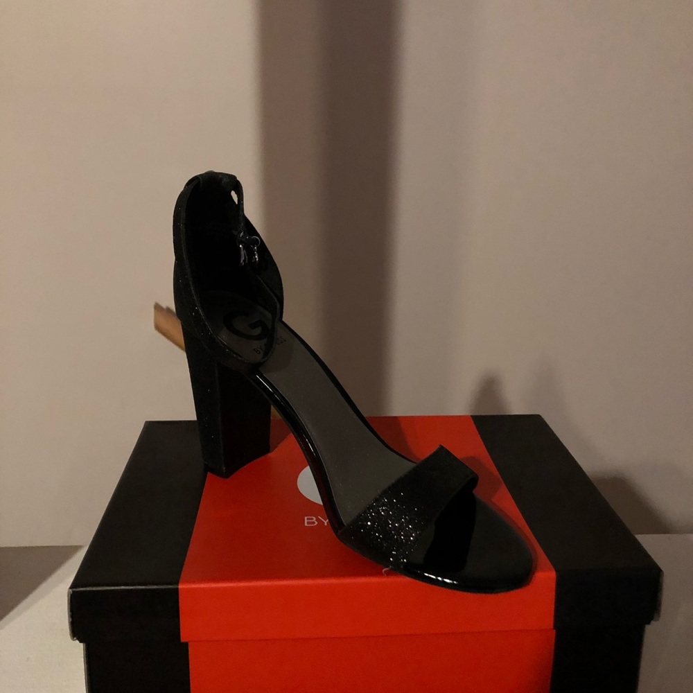 Guess gently worn black high heels shoes